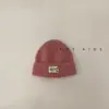 Gorro de Lana para Niños Otoño e Invierno Elegante Pequeño Logo Gorro Tipo Calavera de Punto Moda de Invierno para Niño Bebé Gorro de Moda Tendencia