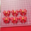 Lazo festivo rojo accesorios de resina pegamento en crema DIY carcasa de teléfono móvil pasador para el pelo cuerda para la cabeza agujero para zapatos adornos decorativos para zapatos