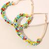 Hermosos pendientes tejidos a mano con cuentas de arroz exageradas europeas y americanas, pendientes femeninos de estilo étnico bohemio con nicho colorido.