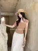Xiu Xixi 2026 Verano Etiqueta Blanca Elegante Versátil Hombros Descubiertos Nudo Adelgazante Color Sólido Manga Corta Camiseta de Tencel para Mujer 89782