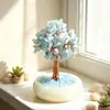 El fabricante está vendiendo grava de cristal natural, figuritas de árbol de la fortuna, bases de grava de porcelana blanca y rodajas de ágata, que se utilizan como decoraciones de oficina para atraer la riqueza.