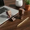 Accesorios creativos para coche, pastillas aromáticas de aromaterapia, adornos de figura de madera que mueven las piernas, accesorios para el interior del coche, lindo robot de madera maciza