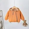 Jaqueta corta-vento com capuz infantil para primavera e outono, unissex, com estampa de desenho animado para bebê, corta-vento, jaqueta solta com zíper oblíquo para criança pequena