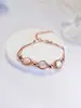 Pulsera de Piedra Ojo de Gato Chapada en Oro Real, Sensación de Lujo Ligero de Alta Gama, Joyería Redonda de Aleación, Venta al por Mayor para Mujeres
