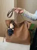 Bolso de cubo retro de gran capacidad para mujer, nueva colección otoño/invierno 2026, bolso de hombro con cadena a la moda, bolso cruzado de nicho para el día a día