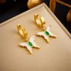 Pendientes de acero de titanio con forma de mariposa blanca de diamante de personalidad europea y americana, diseño de nicho para mujer, ligeros, de lujo, con hebilla de oreja verde, venta al por mayor