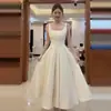 Vestido de Meio Comprimento para Férias na Praia Estilo Novo Verão 2026, Vestido de Alcinha Cor Champagne Francês Estilo Fada, Absolutamente Deslumbrante e Super Bonito