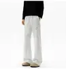 Calças bordadas coloridas de secagem rápida para homens, adequadas para primavera e outono, apresentando um corte inclinado estilo americano, design casual, perna larga moderna e estilo ligeiramente flare, longo e à prova de vento.