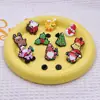 Serie Navideña Transfronteriza Insignias de Dibujos Animados de PVC Muñeco de Nieve Elk DIY Accesorios para Ropa Broche de Papá Noel