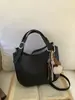 Bolso Pequeño Retro Coreano de Mano para Mujer 2025 Nuevo Bolso de Hombro Cruzado Versátil de Gama Alta Bolso Tote Tipo Cubo