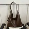 Outono e inverno vintage grande capacidade bolsa feminina 2024 nova bolsa de trabalho para deslocamento bolsa de ombro casual fashion bolsa de balde