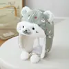 Nuevo sombrero Lei Feng para niños con protección para los oídos, sombrero cálido de estilo coreano con dibujos animados de dinosaurios lindos para invierno, producto transfronterizo para niños