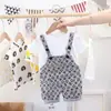 Ropa de Verano para Niños de Cruce de Fronteras Nuevo Estilo Niños y Niñas Ropa para Bebés Monos Conjunto de Manga Corta Dos Piezas Moderno