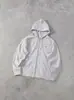 Sudadera con capucha y cremallera de alta gama para hombre y mujer, casual para exteriores, transfronteriza, estilo europeo y americano, con bloques de color y bordado de pececitos