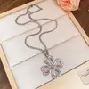 Collar Cruzado Flor de la Suerte Corazón Moda Nicho Trébol de Cuatro Hojas Cadena Larga para Suéter Accesorios de Otoño e Invierno para Mujer