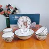 Weiliang Yilu te tiene juego de vajilla de cerámica tazón plato cuchara ciervo abanico regalo al banco venderá a los clientes juego de seis piezas