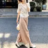 Conjunto de verano: un conjunto completo de tops de manga corta y pantalones de pierna ancha 2026, un estilo relajado y casual, un traje atractivo para mujer