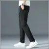 Pantalones casuales de verano para hombre, corte holgado, cintura elástica, pierna recta largos, pantalones de traje negros para primavera y otoño, estilo seda de hielo ultradelgada