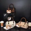Bolso Boston de Felpa de Contraste de Color Retro de Gama Alta para Mujer 2025 Nuevo Bolso Cruzado de Nicho Bolso de Hombro Casual Estilo Coreano