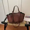 Bolso de mano vintage de alta gama para mujer, nuevo bolso de hombro de moda 2026, bolso tote tipo cubo de gran capacidad para ir al trabajo, moderno
