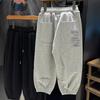 Pantalones de chándal para niño Primavera y Otoño 2026 Nuevos Elegantes Modernos Pantalones Largos Holgados Deportivos para Niños Mayores Estilo Urbano Moderno