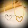 Collar Casual y Versátil de Acero de Titanio con Corazón para Mujer Pendientes de Moda de Celebridad de Internet Set de Pendientes de Cadena para Clavícula de Mujer Decoración