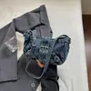 Bolsa jeans feminina estilo biker retrô americana, nova moda 2026 versátil casual de alta qualidade para ombro ou axila