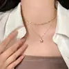 Colar de estrelas multicamadas vintage transfronteiriço europeu e americano para mulheres, com um design único, corrente de suéter com borla de nicho, acessório doce e cool