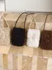 Bolso retro mullido de estilo coreano transfronterizo para mujer, nuevo modelo de verano 2026, bolso de diseño exquisito de nicho, bolso cruzado, bolso para teléfono