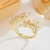 Nuevo anillo de espiga de circonita cúbica de corte marquesa de doble capa transfronterizo, color dorado, lujo ligero, brillante, anillo abierto ajustable para mujer