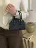 Bolsa de Mão Simples e Estilosa Estilo Coreano Bolsa Baguete para Mulheres 2026 Inverno Nova Retro Estilosa Versátil Bolsa de Ombro Transversal