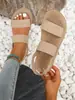 Zapatos planos de otoño y verano, nueva moda para exteriores, sandalias para mujer, zapatillas con correa de viento para vacaciones, playa Xia Wei