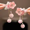 2026 Ano Novo Tassel Vermelho Grampo de Cabelo Crianças Saudação de Ano Novo Dança do Leão Presilha de Cabelo Acessório de Cabelo Meninas Estilo Antigo Hanfu Presilha Adorno de Cabeça