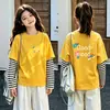 Camiseta de manga larga de algodón puro para niñas, top base elegante y moderno para niños, adecuada para primavera y otoño de 2026, con un diseño de imitación de dos piezas