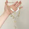 Colar Estilo Férias Boêmio com Concha Dourada e Estrela-do-Mar para Mulheres, Corrente de Clavícula em Camadas, Corrente de Pescoço Versátil para Fotos na Praia, Moderno
