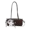 Bolso de mano de moda transfronterizo 2026, bolso de axila de moda de alta gama, bolso de hombro, bolso baguette simple de estilo coreano de nicho
