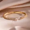 RAKOL Moda Luxo Leve Cobre Incrustado Zircônia Trevo de Quatro Folhas Aberto Ajustável Pulseira Feminina Nicho Toque de Alto Padrão Joia de Mão