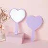 Fornecimento exclusivo transfronteiriço de espelhos de mão em estoque, espelhos de maquiagem de alta definição para atacado, espelhos de mesa DIY com cabo em formato de coração, portáteis e convenientes