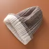 Suave y Pegajoso Cachemir 2026 Otoño/Invierno Nuevo Unisex Moda Casual Protección para los Oídos Usable por Ambos Lados Moda Gorro de Punto