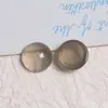 Versión coreana de gelatina transparente redonda de resina media pastilla parche pendientes DIY tocado para mujer funda de teléfono móvil material accesorios material