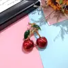 Broche de cereza de diseño japonés y coreano para mujer, nuevo, accesorio versátil de nicho para suéteres y trajes, venta al por mayor directa del fabricante