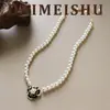 Moda Retro Francesa Elegante Collar de Camelia de Esmalte Negro Perla Cadena de Clavícula Versátil Estilo de Nicho de Lujo Ligero