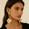 Nuevos pendientes largos de metal con diseño de flor hueca dorada, de lujo ligero de alta gama, transfronterizos, para mujer, joyería de moda y sencilla