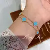 Nuevo Pulsera de Cuatro Hojas de Doble Capa Rosa Nácar Cadena Doble de Alta Gama Nicho Pulsera de Flor de Cuatro Hojas Mayoreo
