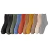 Calcetines para mujer engrosados con forro de felpa calcetines de rizo calcetines de tubo cálidos de invierno absorbentes de sudor transpirables color liso calcetines con base de toalla moda