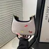 Bolso de Hombro de Media Luna Moderno Elegante Estampado de Lazos para Viajero 2026 Nuevo de Primavera Simple Casual