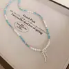 Colar Gargantilha Colorido de Miçangas com Laço para Mulheres Acessórios de Nicho de Luxo Leve Corrente para Clavícula Toque de Alto Padrão Colar de Pérolas para Praia