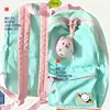 Mochila simple y fresca de color liso 2023 nueva mochila ligera para estudiantes bolso de mano casual de moda versátil para mujer