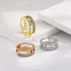 Versión Más Vendida del Anillo Meijia de Tres Filas Completamente Incrustado con Circonita de Diamante para Mujer, Lujo Ligero Nicho Diseño de Alta Gama Anillo de Pareja Anillo Pulsera