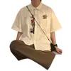 Verano Retro Americano Holgado de Moda Marca Bordado de Dibujos Animados Diseño Único Camisa de Manga Corta Tops para Hombres y Mujeres Camisas de Moda